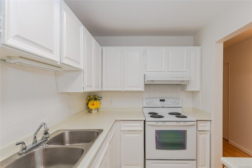 201-1875 Lansdowne Rd, Saanich, BC - Indoor Photo Showing Kitchen With Double Sink