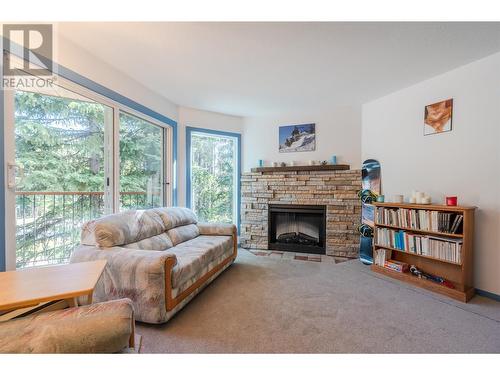 1191 Apex Mountain Road Unit# 202, Apex Mountain, BC - Indoor Photo Showing Living Room With Fireplace