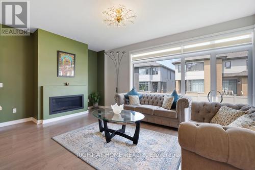 159 Rockmelon Street, Ottawa, ON - Indoor Photo Showing Living Room With Fireplace