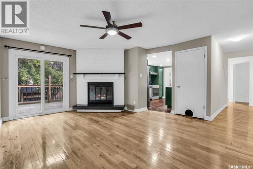 2643 Kliman Crescent, Regina, SK - Indoor Photo Showing Living Room With Fireplace