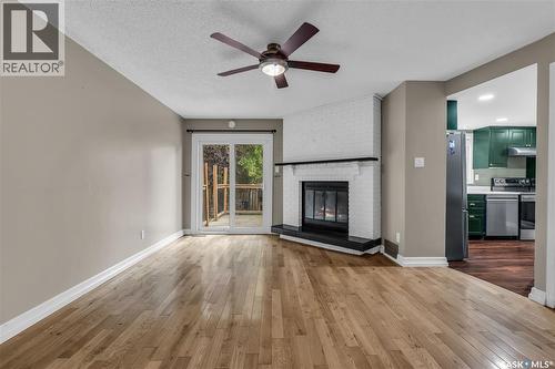 2643 Kliman Crescent, Regina, SK - Indoor Photo Showing Living Room With Fireplace