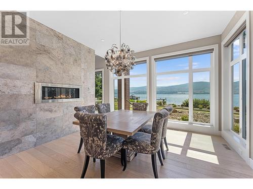 1579 Pritchard Drive, West Kelowna, BC - Indoor Photo Showing Dining Room With Fireplace