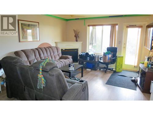 Living Room - 4740 20 Street Unit# 57, Vernon, BC - Indoor Photo Showing Living Room With Fireplace