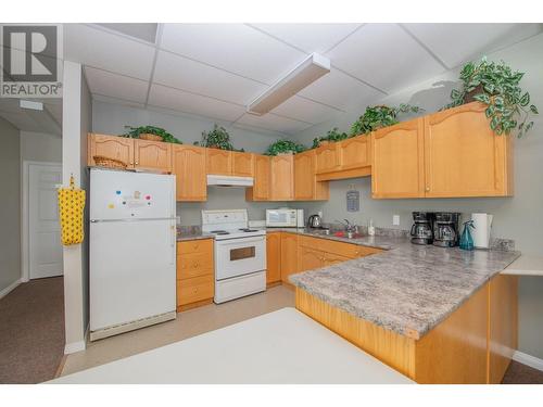 Clubhouse kitchen - 4740 20 Street Unit# 57, Vernon, BC - Indoor Photo Showing Kitchen With Double Sink