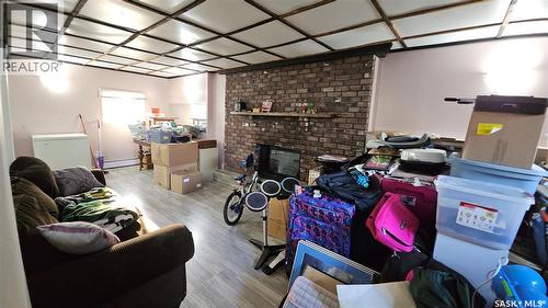 909 Forget Street, Regina, SK - Indoor With Fireplace