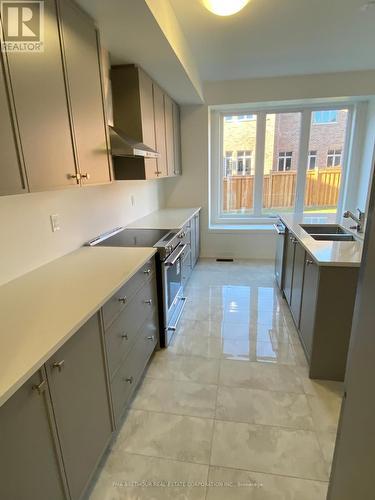 35 Brabin Circle, Whitby, ON - Indoor Photo Showing Kitchen With Double Sink