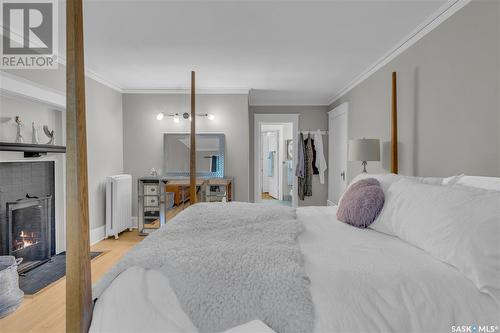 3120 Rae Street, Regina, SK - Indoor Photo Showing Bedroom With Fireplace