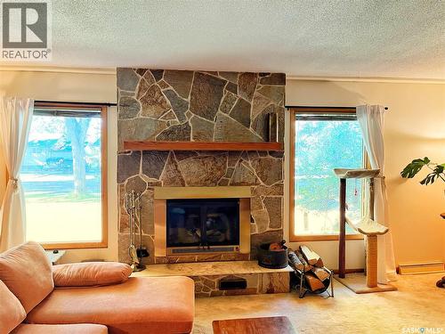792 3Rd Street E, Shaunavon, SK - Indoor Photo Showing Living Room With Fireplace