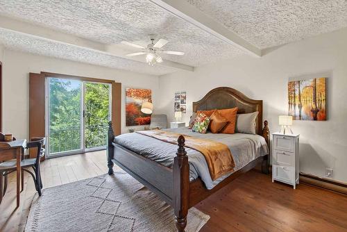 Primary bedroom - 6 Ch. De L'Eau-Claire, Lac-Supérieur, QC - Indoor Photo Showing Bedroom