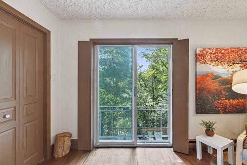 Primary bedroom - 6 Ch. De L'Eau-Claire, Lac-Supérieur, QC - Indoor Photo Showing Other Room