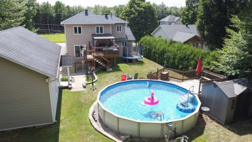 Courtyard - 5200 Rue De L'Église, Notre-Dame-Du-Mont-Carmel, QC - Outdoor With Above Ground Pool With Backyard With Exterior