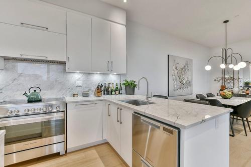 Cuisine - 1501-1900 Rue Émile-Martineau, Laval (Laval-Des-Rapides), QC - Indoor Photo Showing Kitchen With Upgraded Kitchen