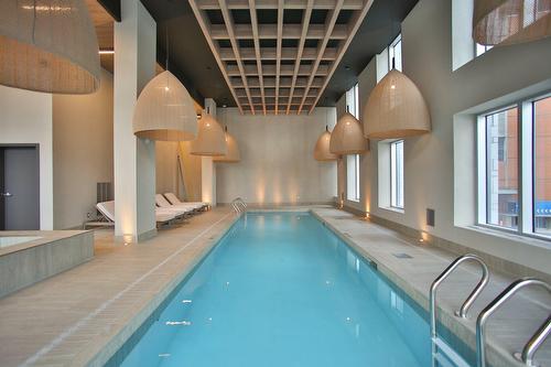 Pool - 612-1288 Rue St-Antoine O., Montréal (Ville-Marie), QC - Indoor Photo Showing Other Room With In Ground Pool