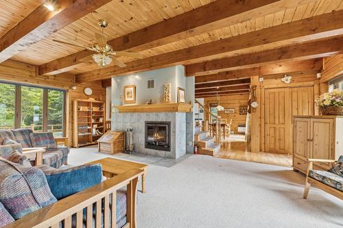 Salon - 90 Ch. De L'Iris, Mont-Blanc, QC - Indoor Photo Showing Living Room With Fireplace