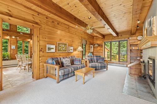 Salon - 90 Ch. De L'Iris, Mont-Blanc, QC - Indoor Photo Showing Other Room With Fireplace