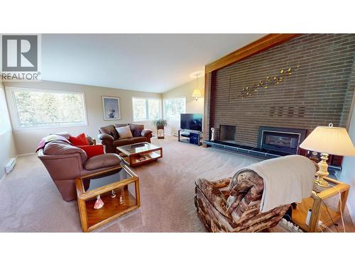 105 Castle Mountain Road, Fernie, BC - Indoor Photo Showing Living Room With Fireplace
