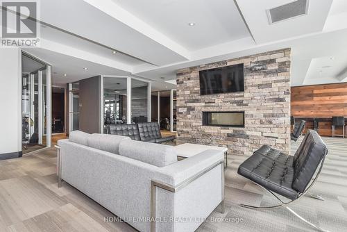 T1-1901 - 330 Phillip Street S, Waterloo, ON - Indoor Photo Showing Living Room With Fireplace