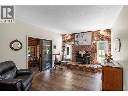 48 Waterside Road, Enderby, BC - Indoor Photo Showing Living Room With Fireplace