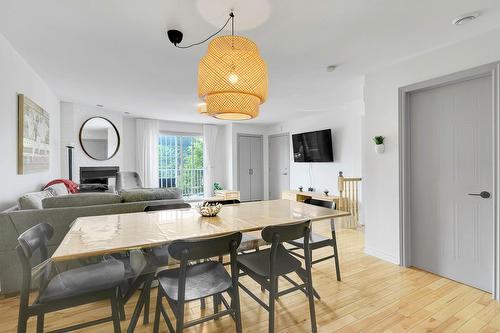 Dining room - 743A Rue Principale, Saint-Sauveur, QC - Indoor Photo Showing Dining Room With Fireplace