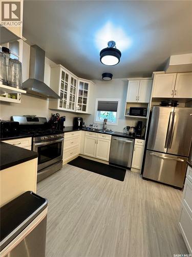 415 Prince Street, Hudson Bay, SK - Indoor Photo Showing Kitchen With Double Sink