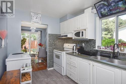 34 - 2700 Battleford Road, Mississauga, ON - Indoor Photo Showing Kitchen With Double Sink