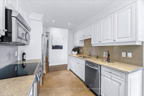 308-23 Rean Drive, Toronto, ON - Indoor Photo Showing Kitchen With Stainless Steel Kitchen With Double Sink With Upgraded Kitchen