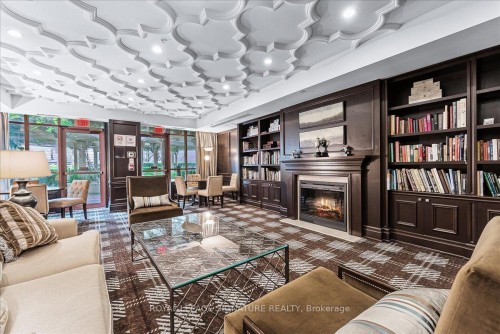 308-23 Rean Drive, Toronto, ON - Indoor Photo Showing Living Room With Fireplace