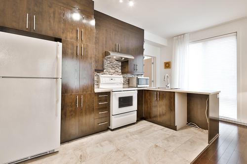 Cuisine - 102-6605 Rue Hochelaga, Montréal (Mercier/Hochelaga-Maisonneuve), QC - Indoor Photo Showing Kitchen