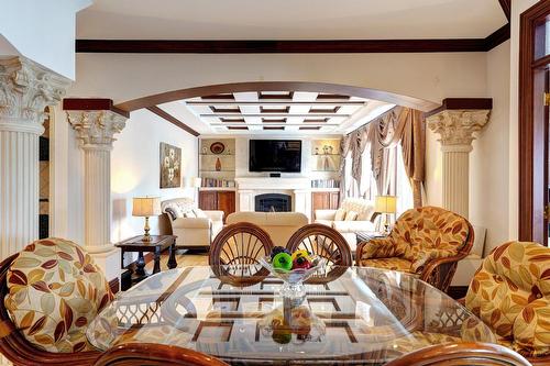 Coin-repas - 6002 Rue Portelance, Laval (Auteuil), QC - Indoor Photo Showing Dining Room With Fireplace
