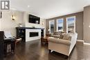 3326 Green Brook Road, Regina, SK  - Indoor Photo Showing Living Room With Fireplace 