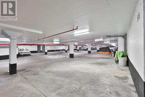 58 - 1050 Shawnmarr Road, Mississauga, ON - Indoor Photo Showing Garage