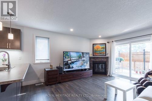151 Rollins Drive, Belleville (Belleville Ward), ON - Indoor Photo Showing Living Room With Fireplace