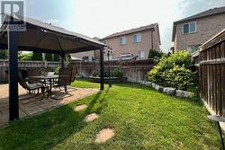 Fully-Fenced Backyard with Stone Patio & Gazebo - 