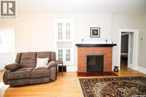 671 2Nd Street E, Shaunavon, SK - Indoor Photo Showing Living Room With Fireplace
