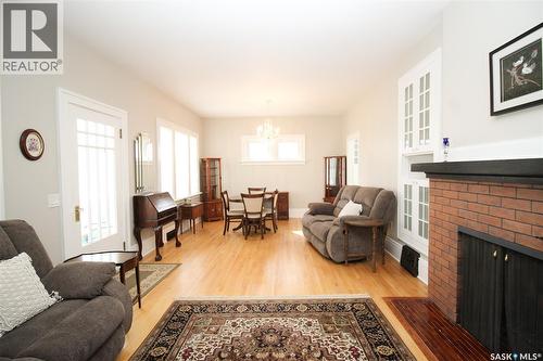 671 2Nd Street E, Shaunavon, SK - Indoor Photo Showing Living Room With Fireplace