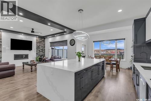 144 Forsey Avenue, Saskatoon, SK - Indoor Photo Showing Kitchen With Fireplace With Upgraded Kitchen