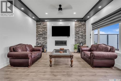 144 Forsey Avenue, Saskatoon, SK - Indoor Photo Showing Living Room With Fireplace