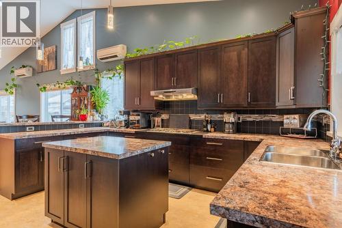 7150 Devito Drive, Trail, BC - Indoor Photo Showing Kitchen With Double Sink
