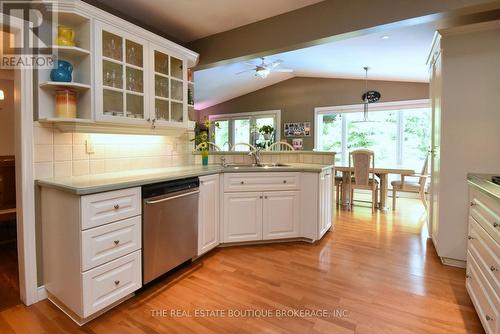 Crisp white Kitchen featuring vaulted ceiling - 4131 Lorraine Crescent, Burlington, ON - Indoor Photo Showing Kitchen With Double Sink
