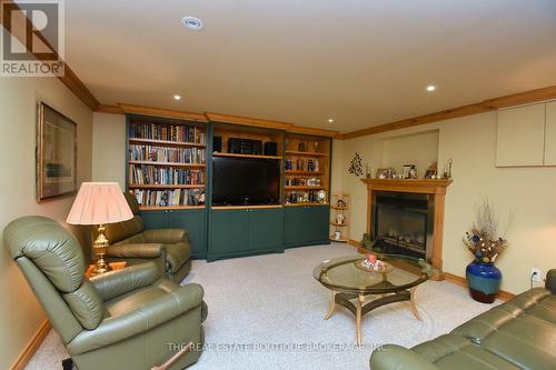 Rec Room featuring cozy fireplace - 4131 Lorraine Crescent, Burlington, ON - Indoor Photo Showing Other Room With Fireplace