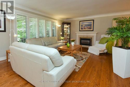 Bright Living Room featuring gas fireplace - 4131 Lorraine Crescent, Burlington, ON - Indoor Photo Showing Living Room With Fireplace