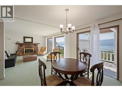 Dining Room - 1163 Menu Road, West Kelowna, BC - Indoor Photo Showing Dining Room With Fireplace