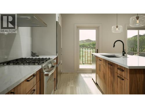 800 Riverside Way Unit# 404, Fernie, BC - Indoor Photo Showing Kitchen With Upgraded Kitchen