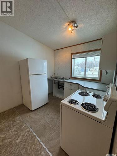 701 2Nd Avenue E, Shellbrook, SK - Indoor Photo Showing Kitchen With Double Sink