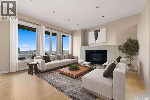6110 Wascana Court, Regina, SK - Indoor Photo Showing Living Room With Fireplace