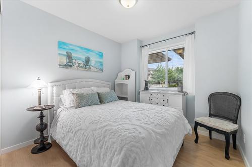 113-1962 Enterprise Way, Kelowna, BC - Indoor Photo Showing Bedroom