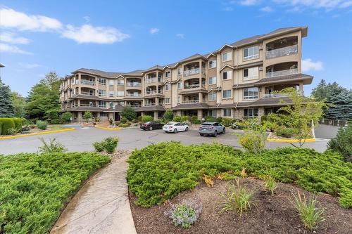 113-1962 Enterprise Way, Kelowna, BC - Outdoor With Facade