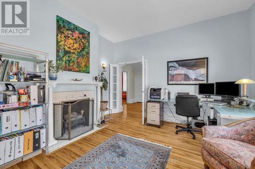 with wood burning fire place - 396 Daly Avenue, Ottawa, ON - Indoor Photo Showing Office With Fireplace