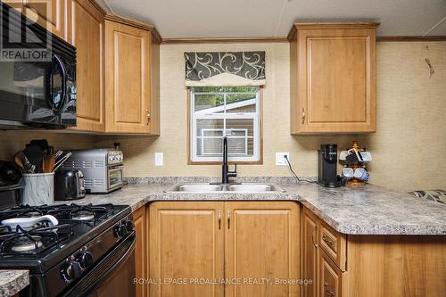 26 Beach View Lane - 486 County Road 18, Prince Edward County (Athol), ON - Indoor Photo Showing Kitchen With Double Sink