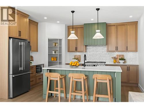 This photo was virtually staged. - 1298 Brechin Place, Kamloops, BC - Indoor Photo Showing Kitchen With Upgraded Kitchen